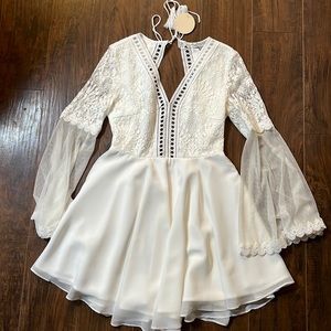 Two sisters white dress.